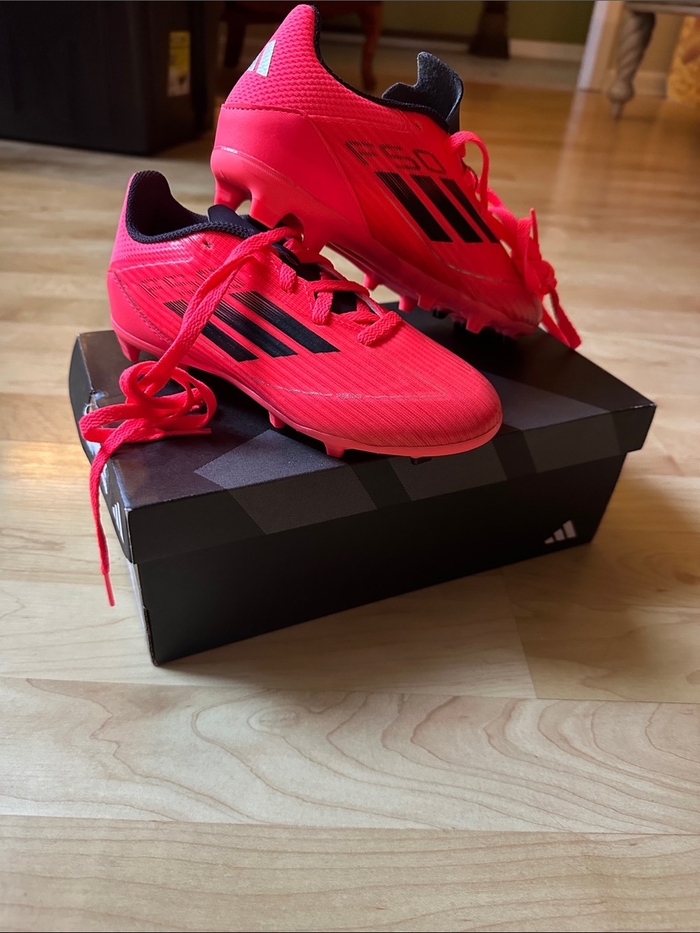 adidas Kids Neon Orange/Pink Soccer Cleats with Black Stripes